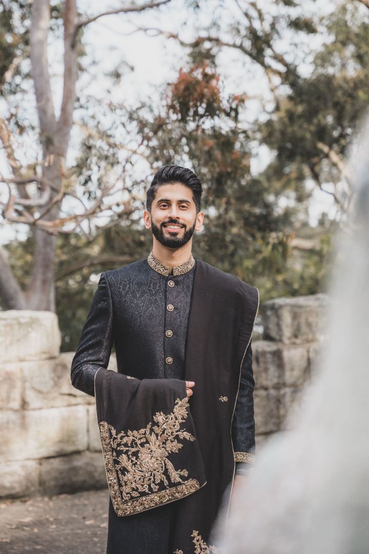 Elegant traditional men's sherwani with intricate embroidery