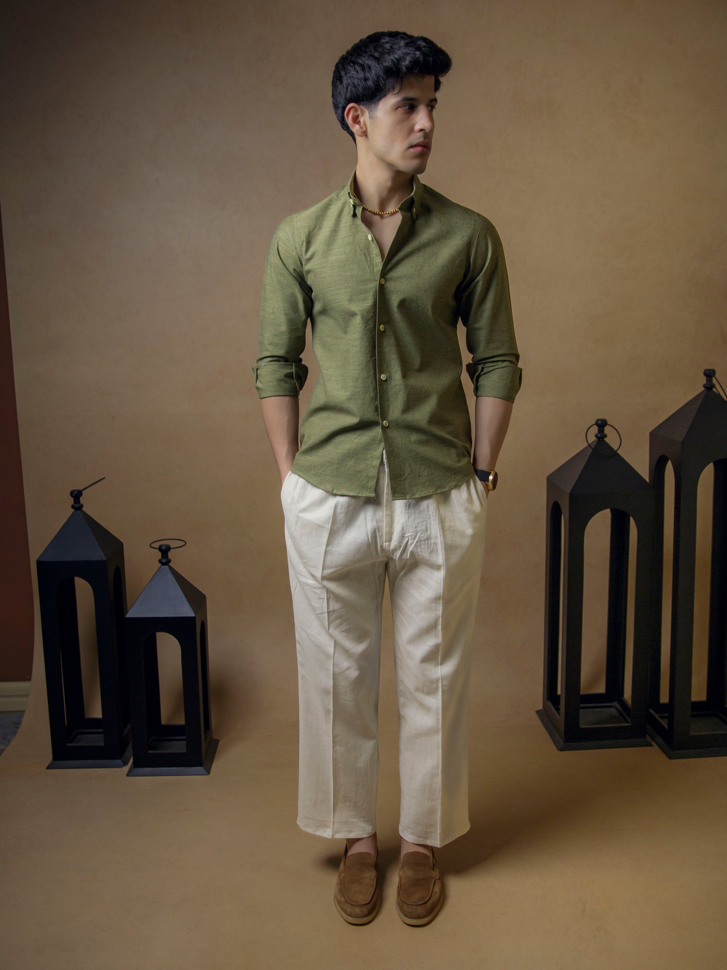 green shirt and white pants 