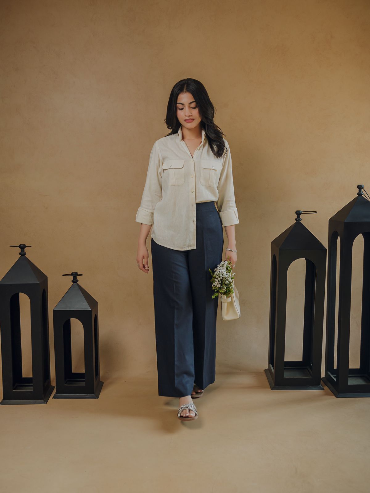 beige shirt and blue pants 